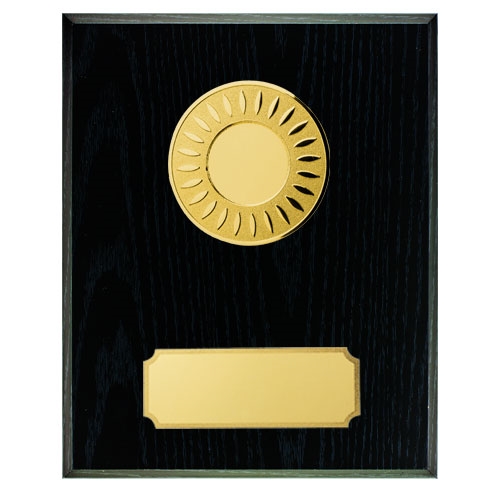 Sort treplakett med gull skilt